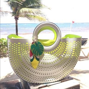 Henri Bendel Perforated Half Circle Tote